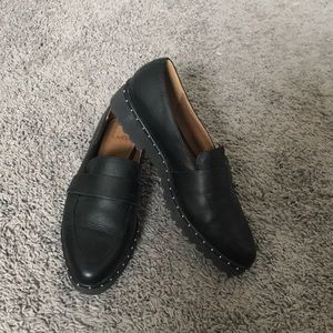 Black studded loafers